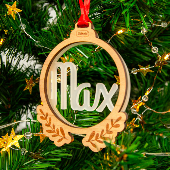Personalized Christmas bauble with an acrylic name and wooden frame
