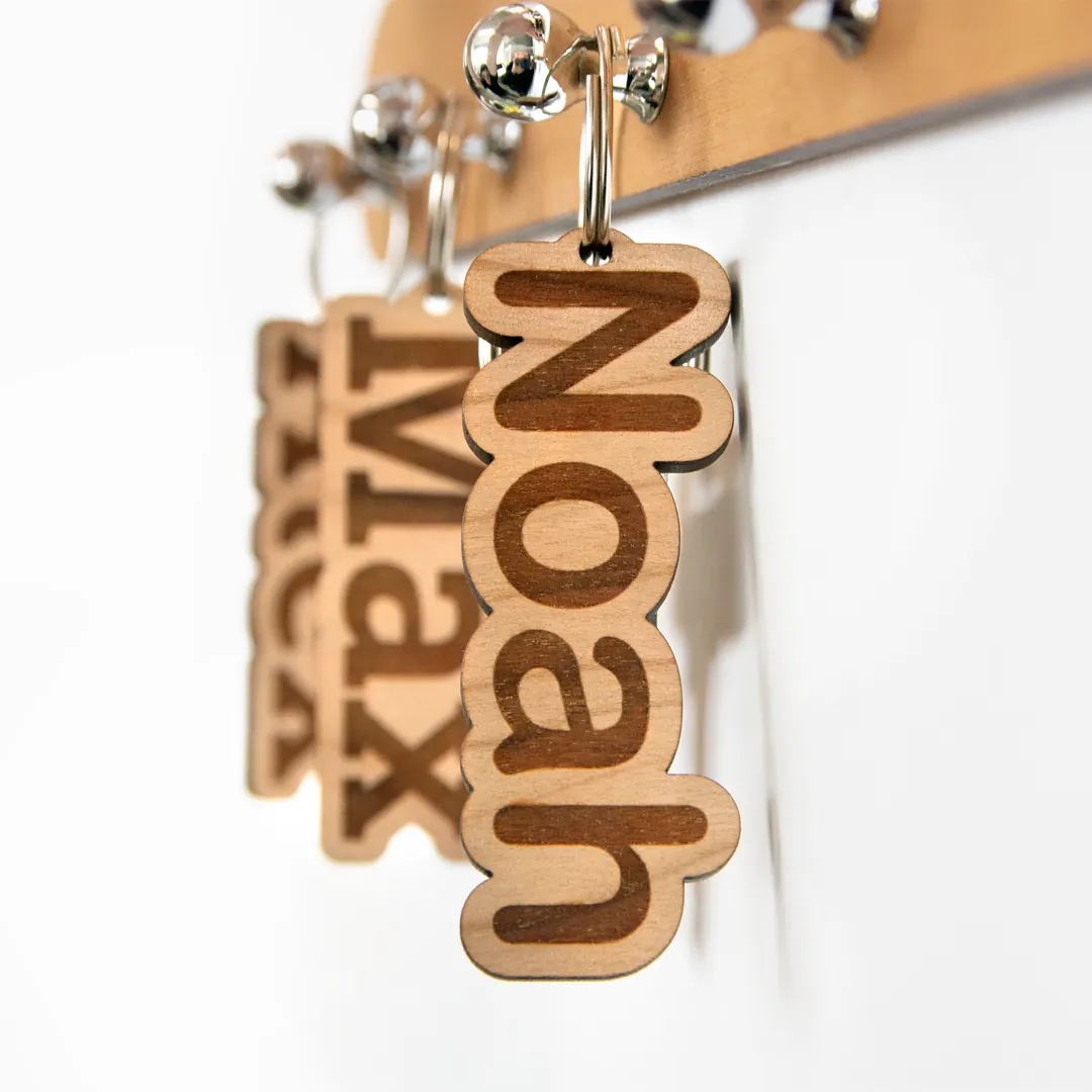 Gepersonaliseerde houten sleutelhanger met naam Gepersonaliseerde houten sleutelhanger met naam