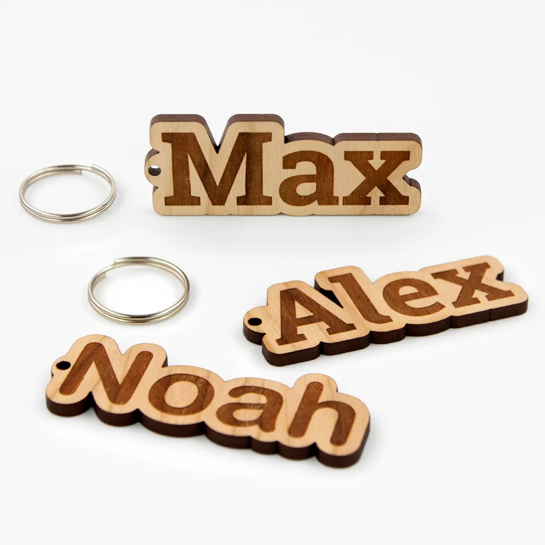 Gepersonaliseerde houten sleutelhanger met naam Gepersonaliseerde houten sleutelhanger met naam